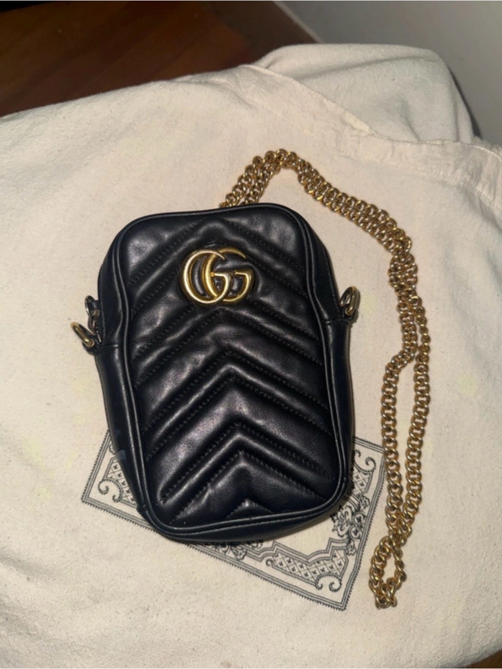 Gucci GG Marmont Vertical Phone
Crossbody Bag